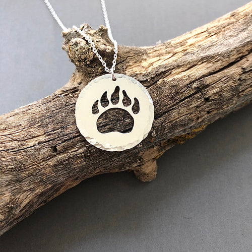 Bear paw cutout in sterling silver disc necklace by Red Door Metalworks 