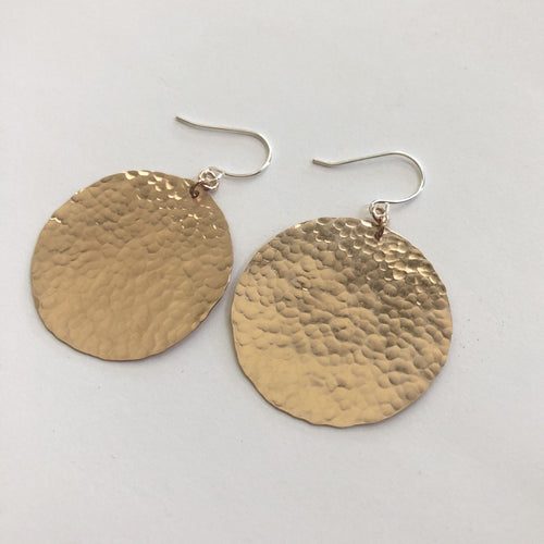 hammered bronze disc earrings by Red Door Metalworks