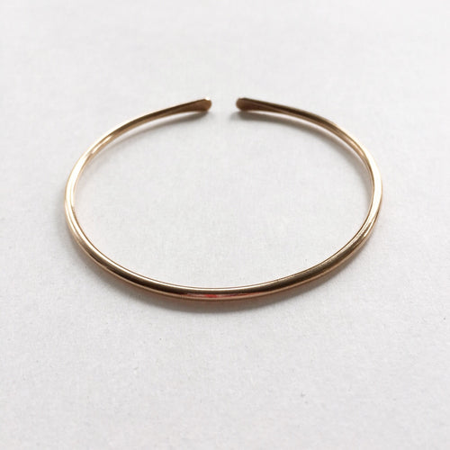Bronze wire cuff by Red Door Metalworks