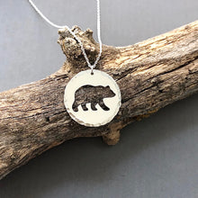 Load image into Gallery viewer, Bear image cutout in sterling silver disc necklace by Red Door Metalworks 
