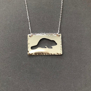 Sterling silver beaver cutout necklace byRed Door Metalworks 
