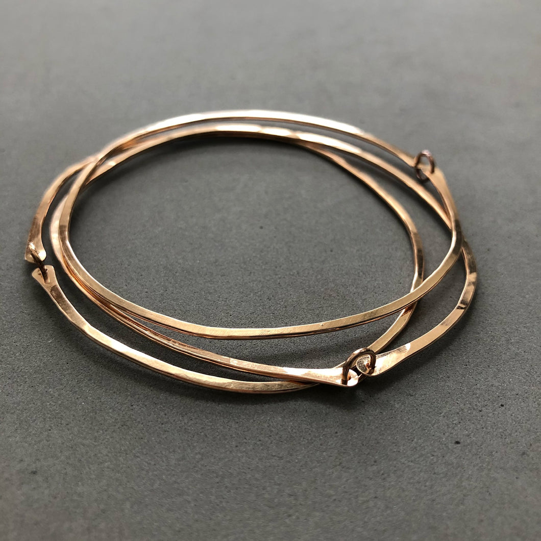 Pebble bangles by Red Door Metalworks