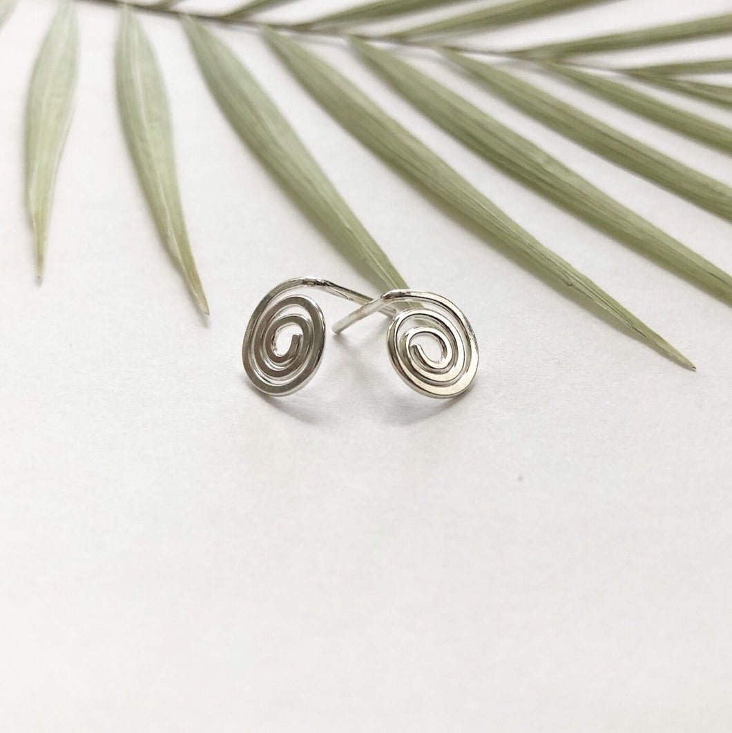 Sterling silver spiral stud earrings by Red Door Metalworks