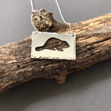 Load image into Gallery viewer, Beaver cutout in sterling silver rectangle by Red Door Metalworks 

