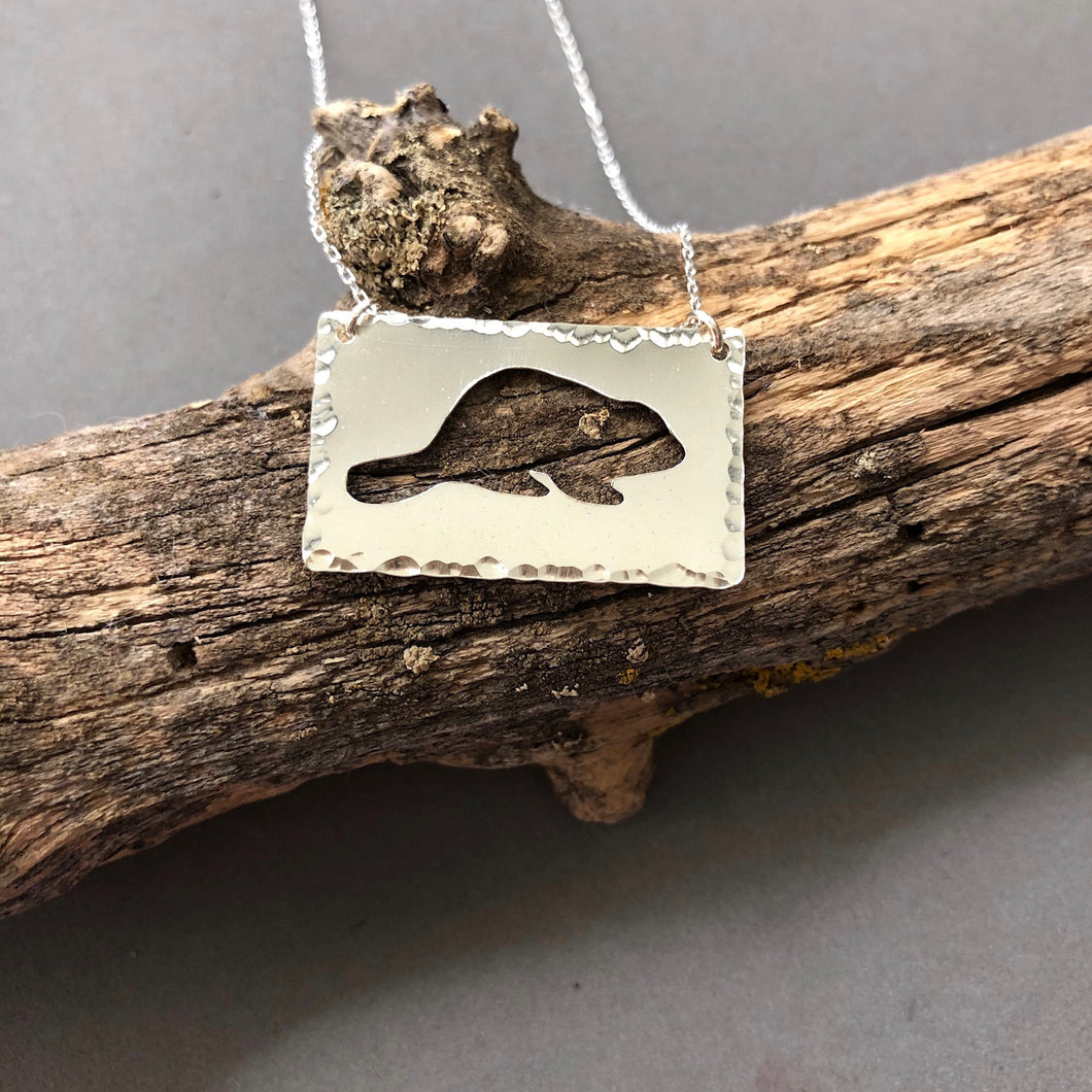 Beaver cutout in sterling silver rectangle by Red Door Metalworks 